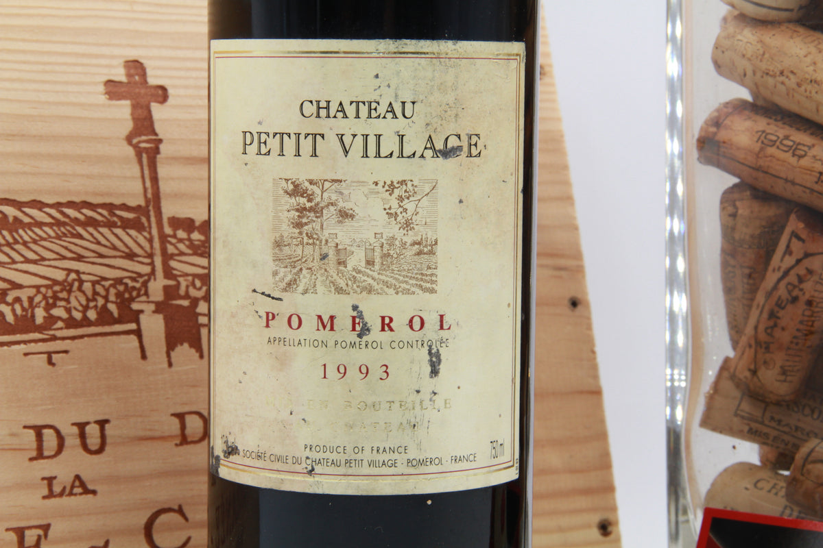 Chateaau Petit Village   pomerol.    1993
