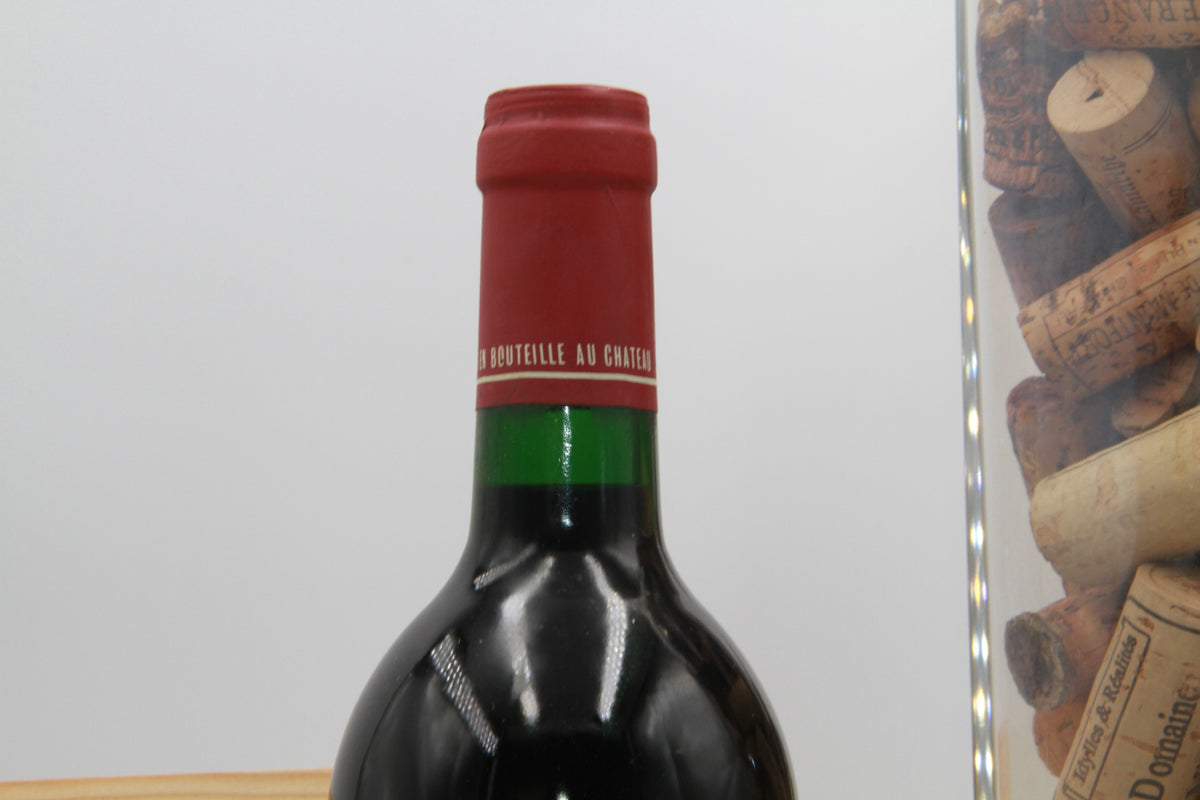 Chateaau Petit Village   pomerol.    1993